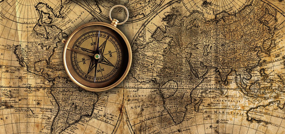 Brass Compass On World Map