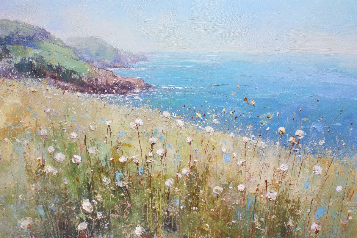 White Wildflowers on a Coastal Cliff