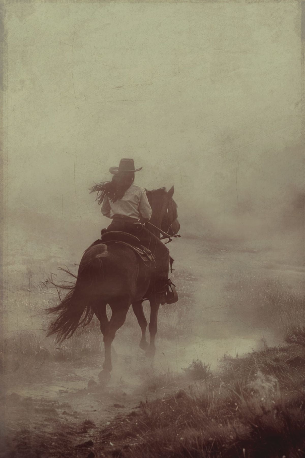 Lone Cowgirl On Horseback