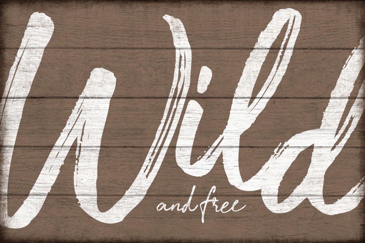 Cursive Wild And Free Sign