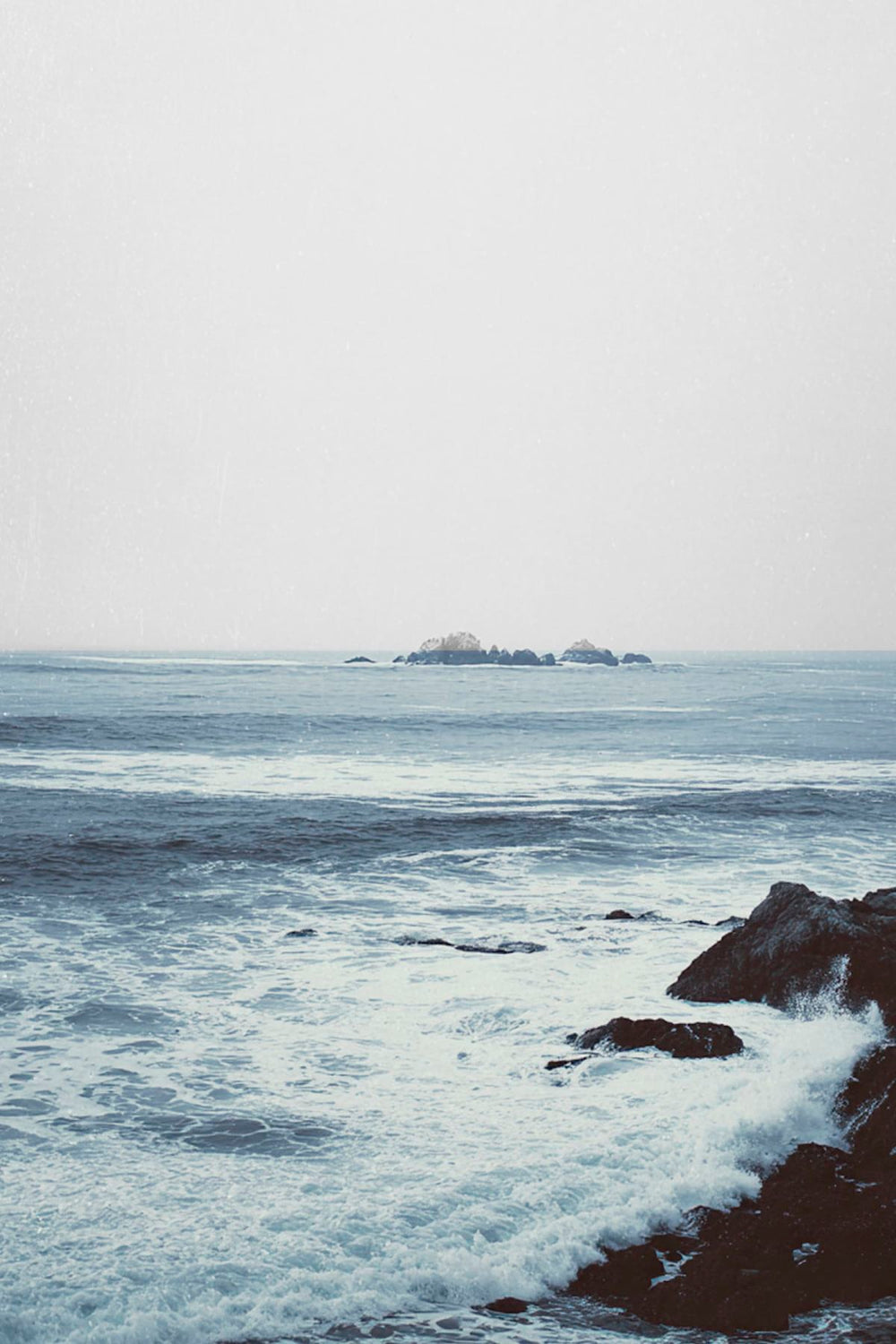 Rocky Coastline With Waves Crashing