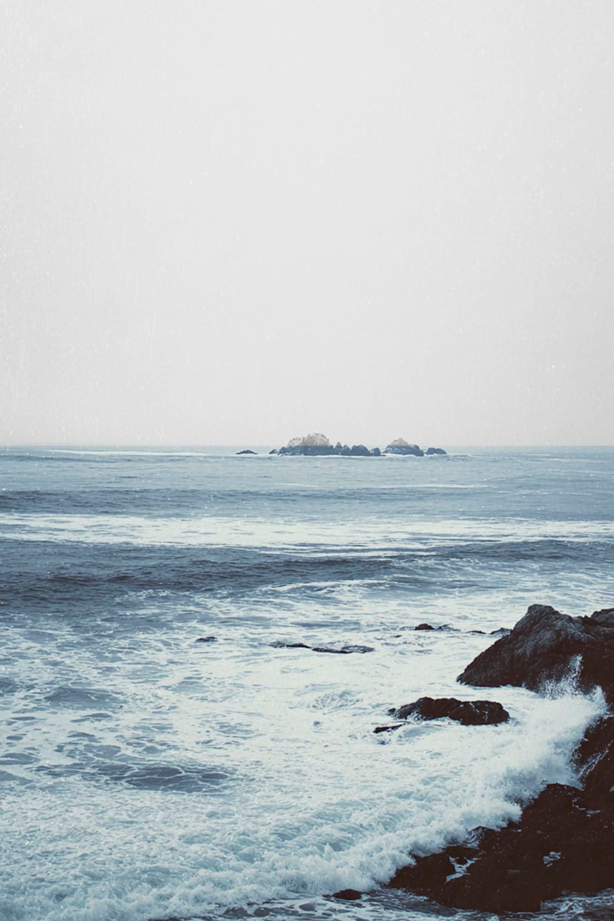 Rocky Coastline With Waves Crashing